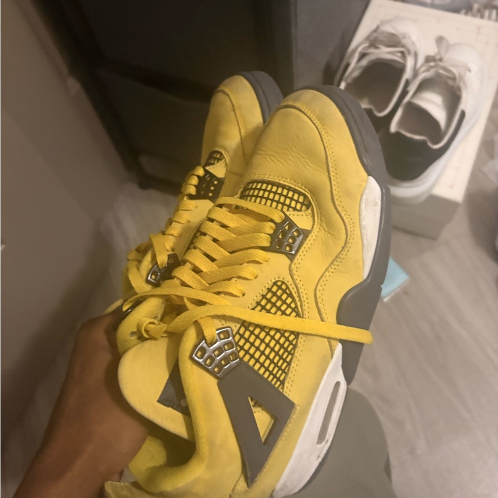 Black And Yellow Lightening Jordan 4’s